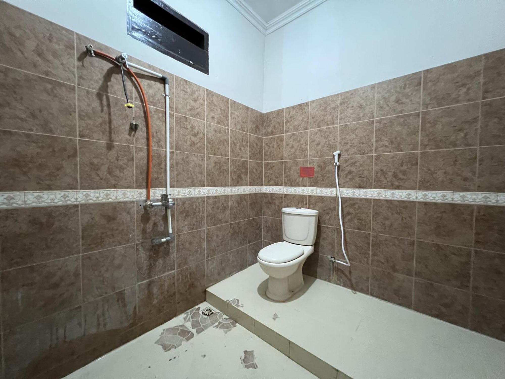 Oyo 92098 Kost Orange Syariah Hotell Makassar Exteriör bild